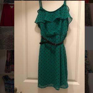 Green dress with black polka dots